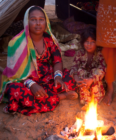 Mother and Child at Campfire in Pushkar