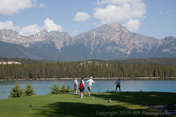 Golfers and mountain.jpg
