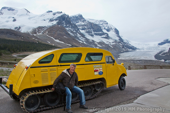 MM and Old Snowmobile and Glacier.jpg
